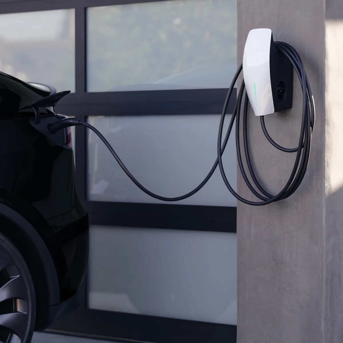 Electric vehicle charging at home with a wall-mounted Level 2 charger